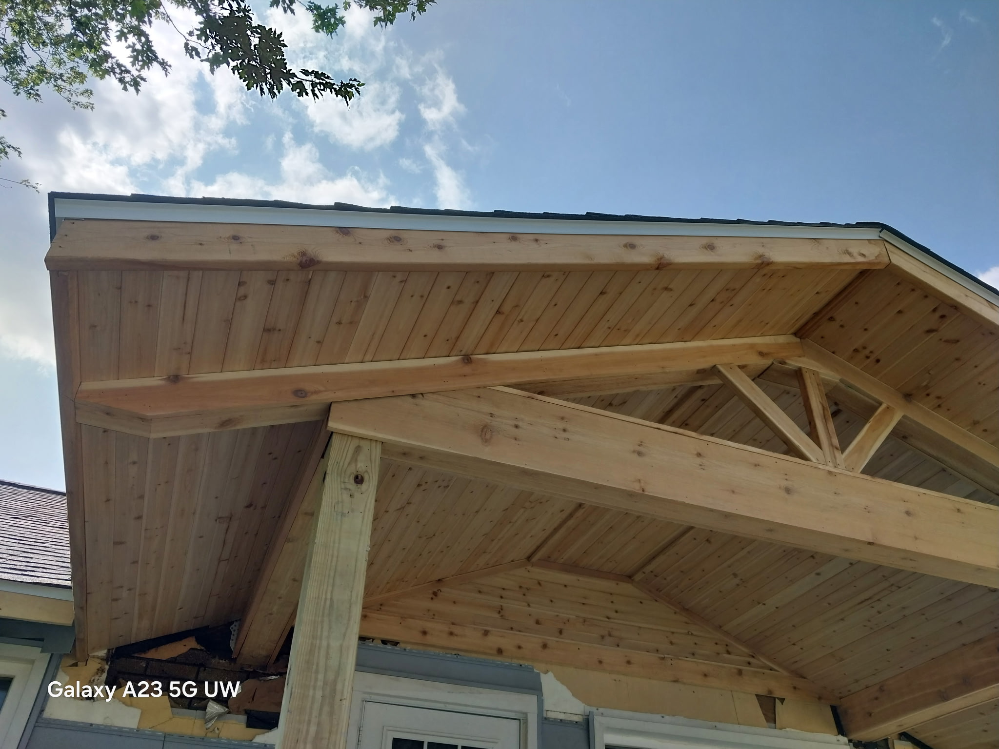 Cedar porch addition on a residential home