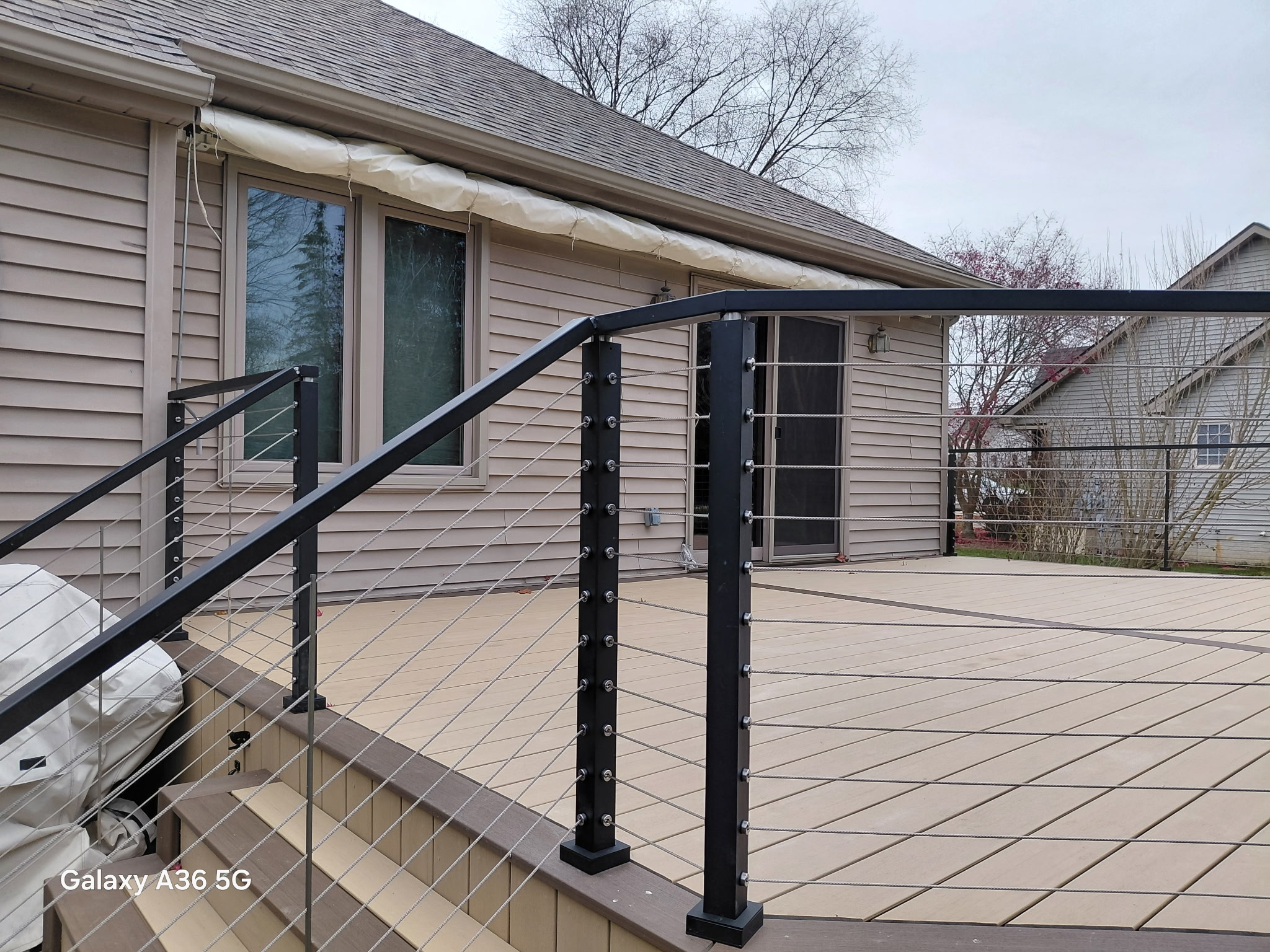 Custom-built wood deck with railings