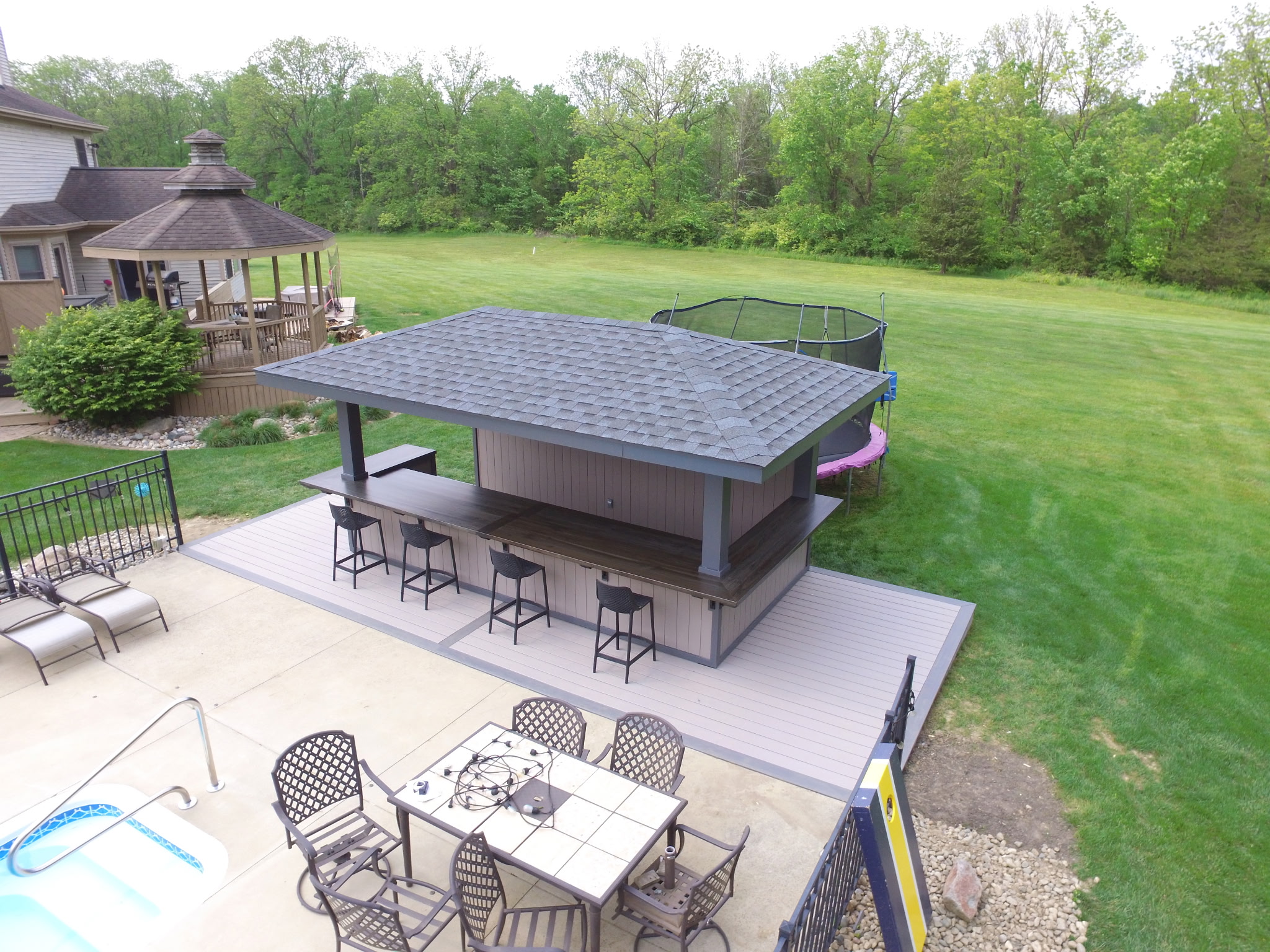 Custom pool tiki house construction