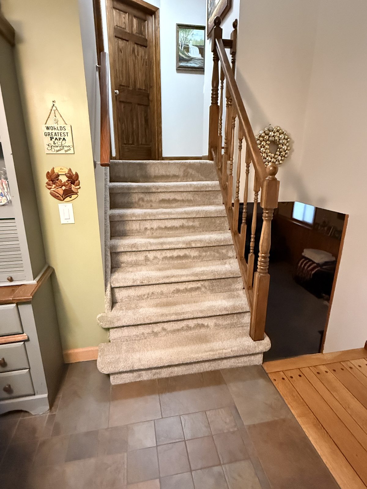 Original carpeted staircase before remodeling